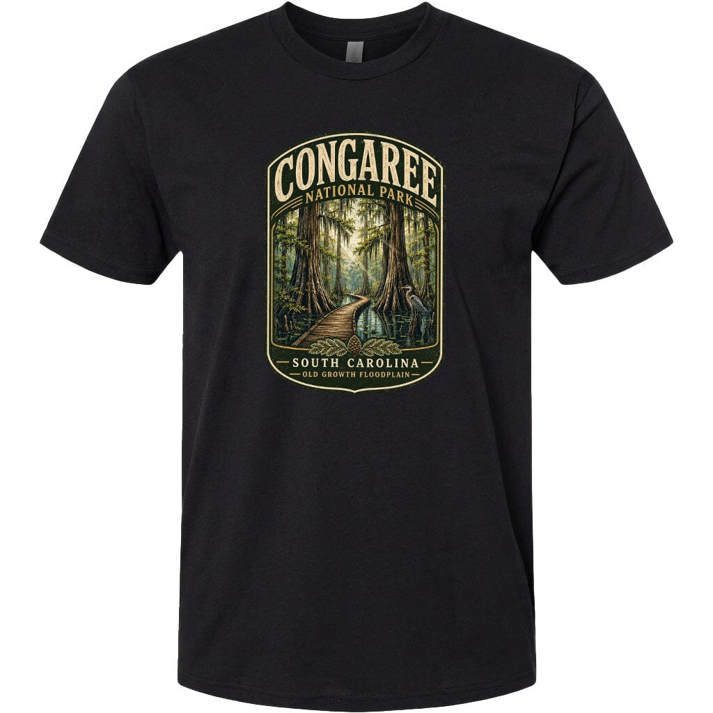 A black t-shirt with a graphic design depicting a forest scene with a path leading through it.
