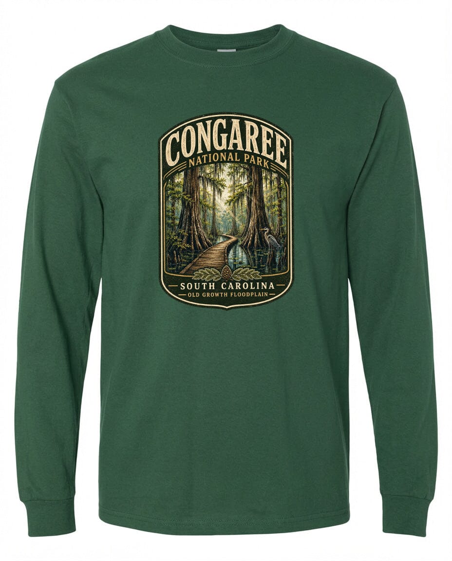 A green long-sleeved t-shirt with a graphic design depicting a forest scene, featuring a path leading through the trees.