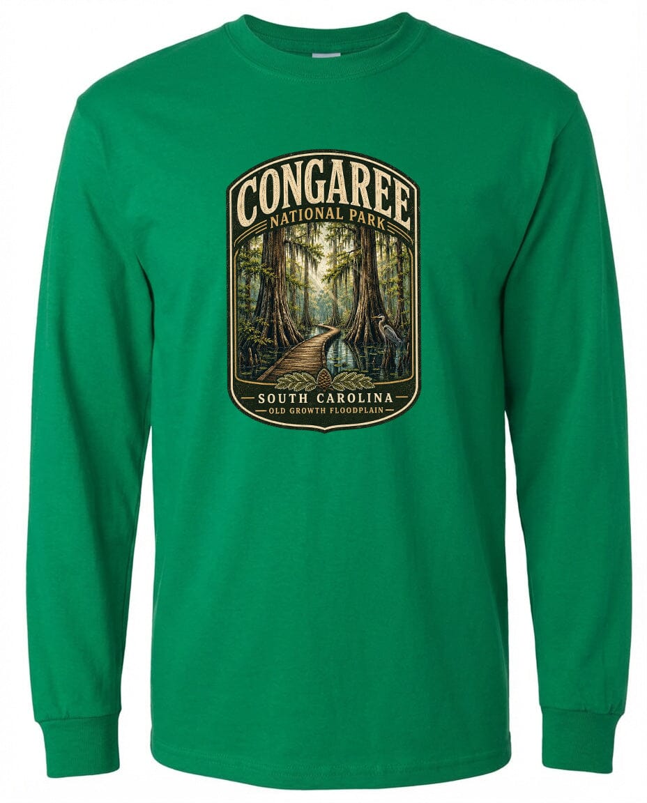 A green long-sleeved t-shirt with a graphic design depicting a forest scene, featuring a path leading through the trees.