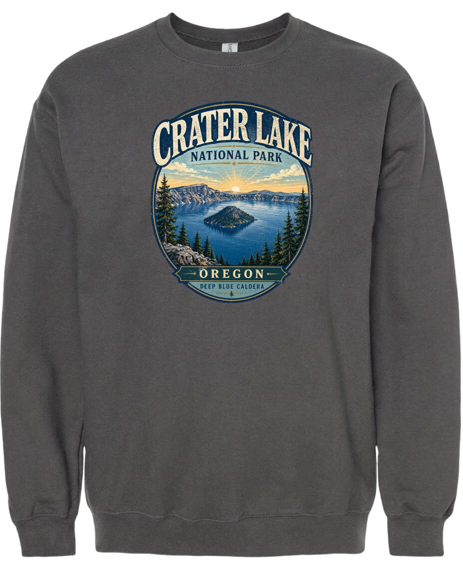 A gray sweatshirt with a graphic design depicting Crater Lake National Park in Oregon.
