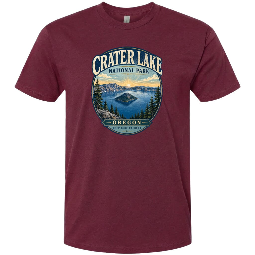 A maroon t-shirt with a graphic design depicting Crater Lake National Park in Oregon.
