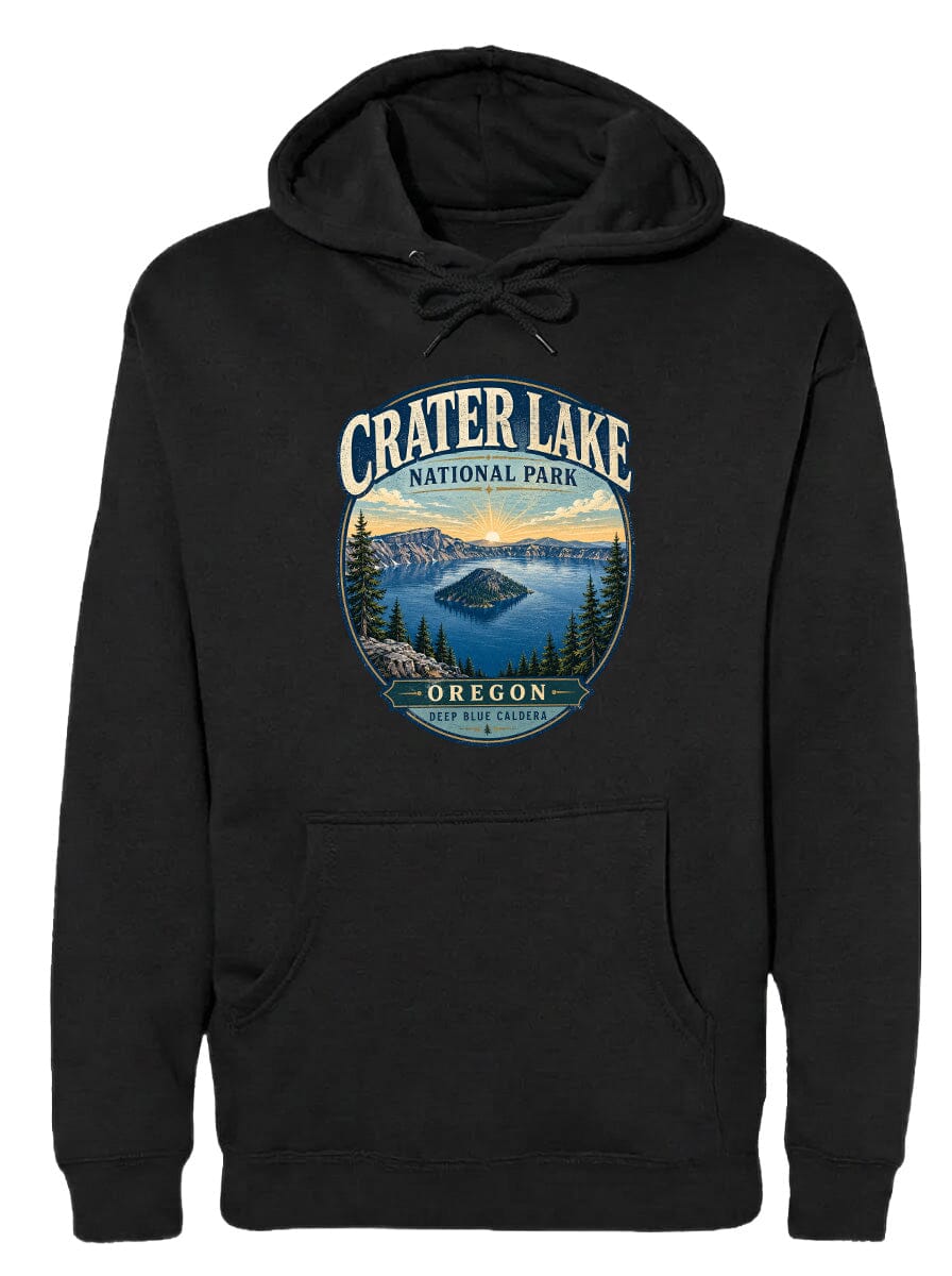 A black hoodie with a graphic design depicting Crater Lake National Park in Oregon, featuring a scenic landscape with a lake, mountains, and pine trees.