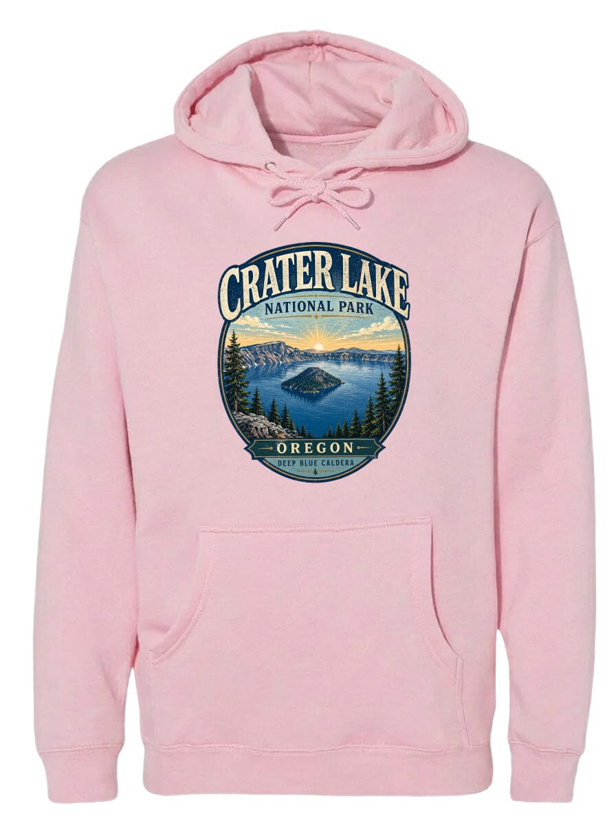 A pink hoodie with a graphic design depicting Crater Lake National Park in Oregon.