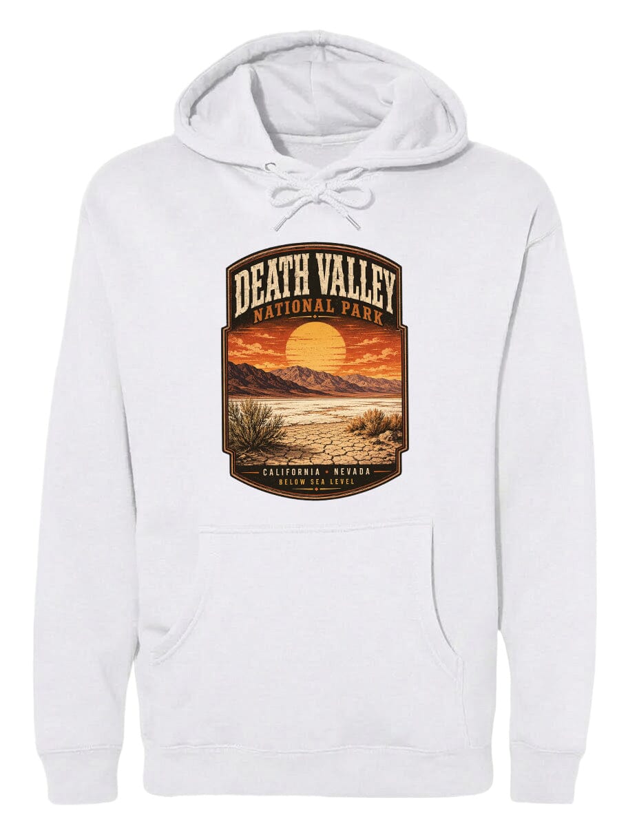 A white hoodie with a graphic design depicting Death Valley National Park, including a sunset landscape and mountains.