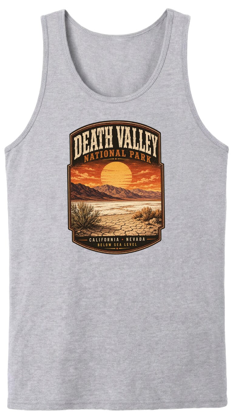 A gray tank top with a graphic design depicting Death Valley National Park, including a sunset landscape and mountains.