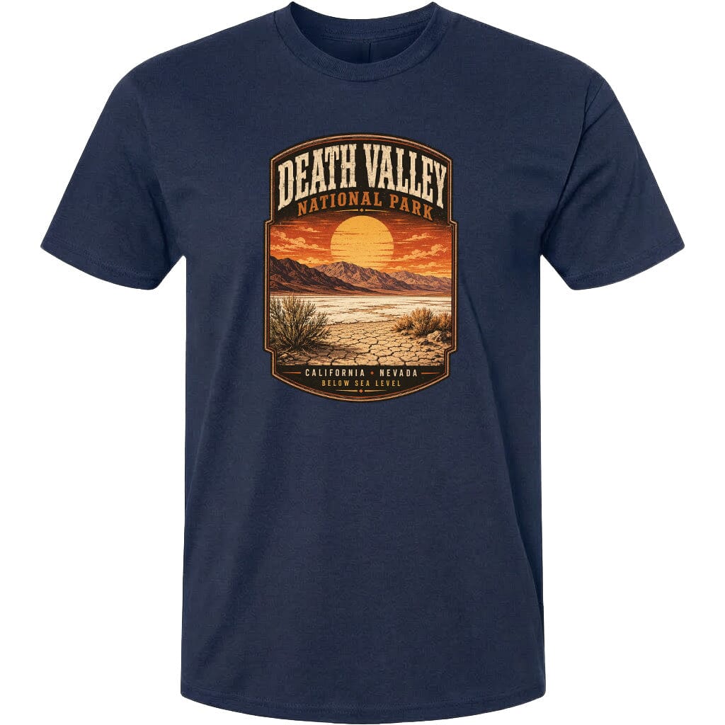 A graphic t-shirt design featuring a desert landscape with mountains, a sunset, and the text "DEATH VALLEY NATIONAL PARK CALIFORNIA NEVADA BELOW SEA LEVEL".