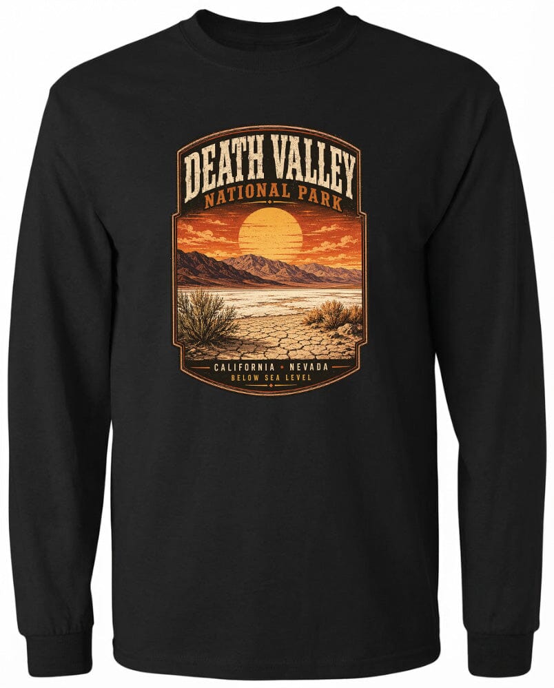 A black long-sleeved t-shirt with a graphic design depicting a desert landscape with mountains, a sunset, and a desert plant.