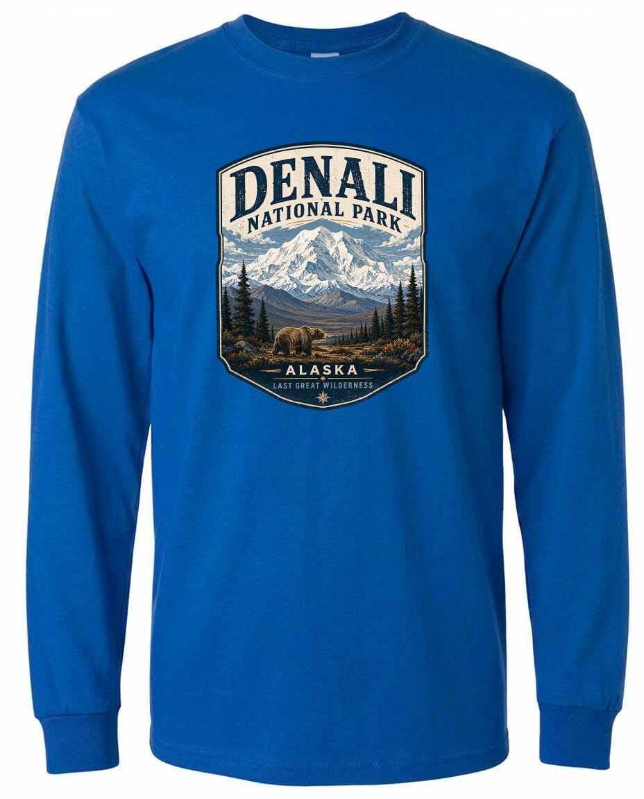 A blue long-sleeved t-shirt with a graphic design depicting Denali National Park and Alaska.