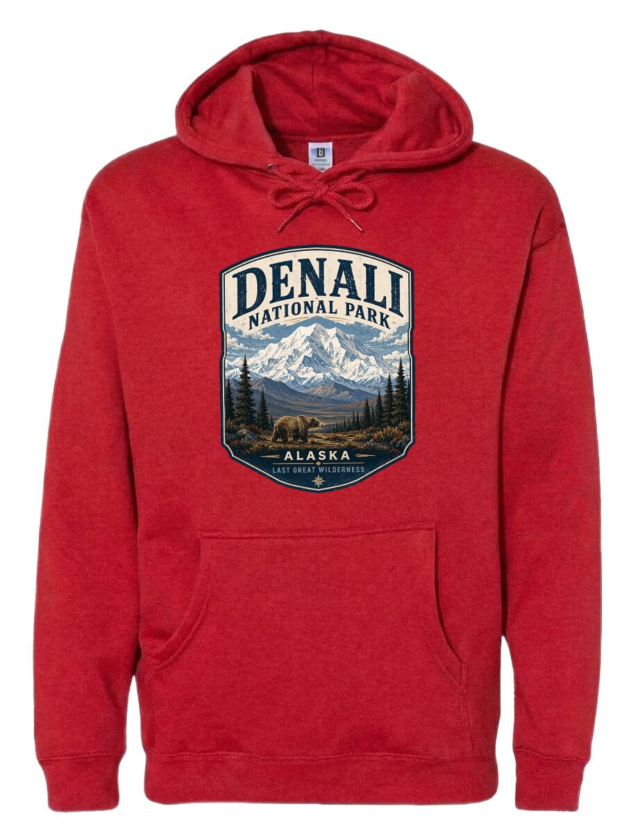 A red hoodie with a graphic design depicting Denali National Park and Alaska, featuring a bear and mountains in the background.