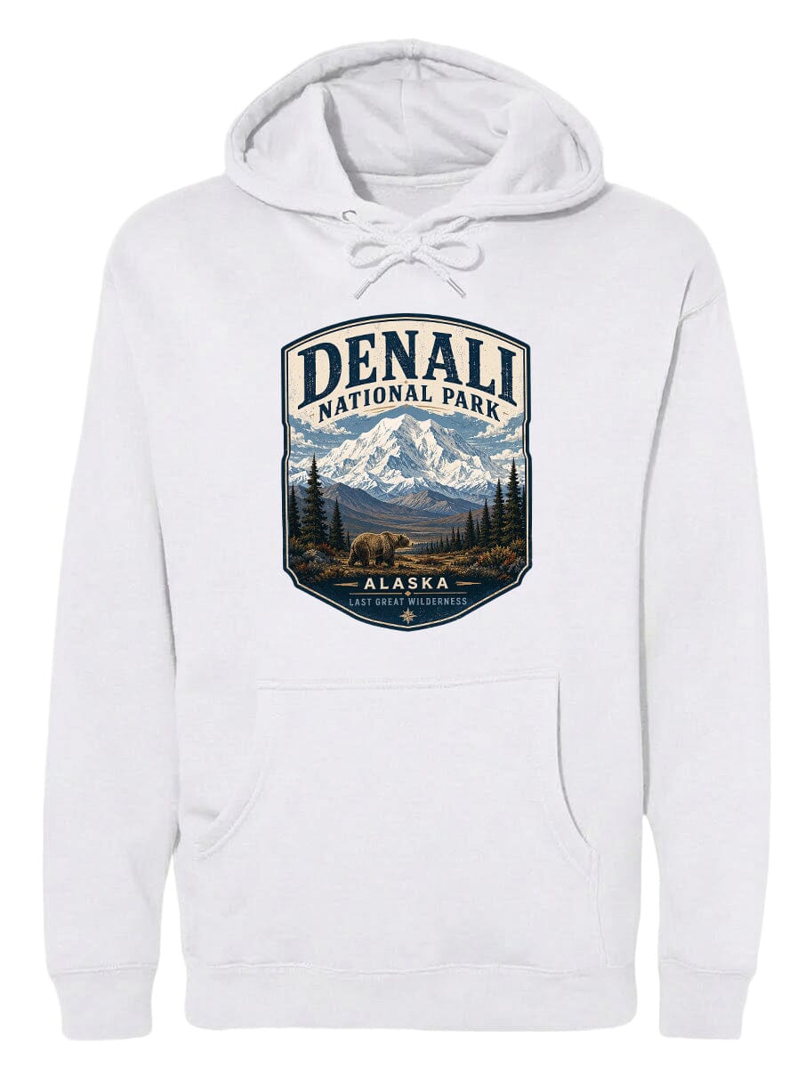 A white hoodie with a graphic design featuring a mountain landscape and bears, along with the text "DENALI NATIONAL PARK ALASKA LAST GREAT WILDERNESS".