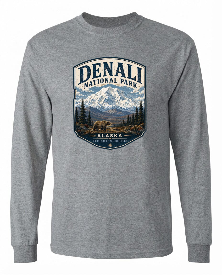 A gray long-sleeved t-shirt with a graphic design depicting Denali National Park in Alaska, featuring a mountain landscape with a bear in the foreground.