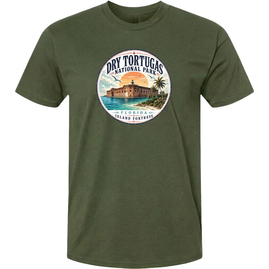 A green t-shirt with a circular graphic design featuring a tropical beach scene and a building, likely representing Dry Tortugas National Park in Florida.