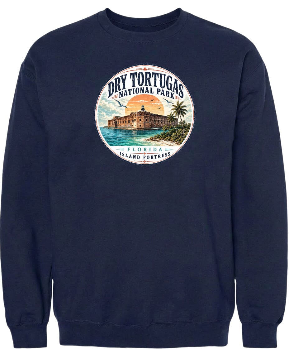 A navy blue sweatshirt with a circular graphic design featuring a building and palm trees, along with the text "Dry Tortugas National Park, Florida Island Fortress".