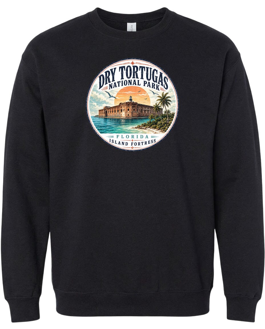 A black sweatshirt with a circular graphic design featuring a building and palm trees, along with the text "Dry Tortugas National Park, Florida Island Fortress".