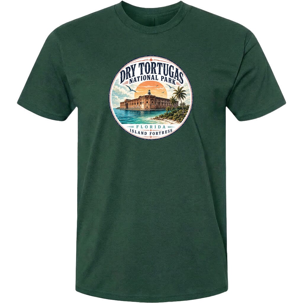 A green t-shirt with a circular graphic design featuring a tropical beach scene and a building, likely representing Dry Tortugas National Park in Florida.
