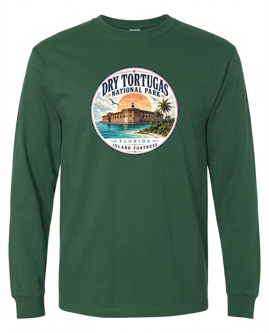 A green long-sleeved t-shirt with a circular graphic design featuring a building, palm trees, and a sunset over a body of water, representing Dry Tortugas National Park in Florida.