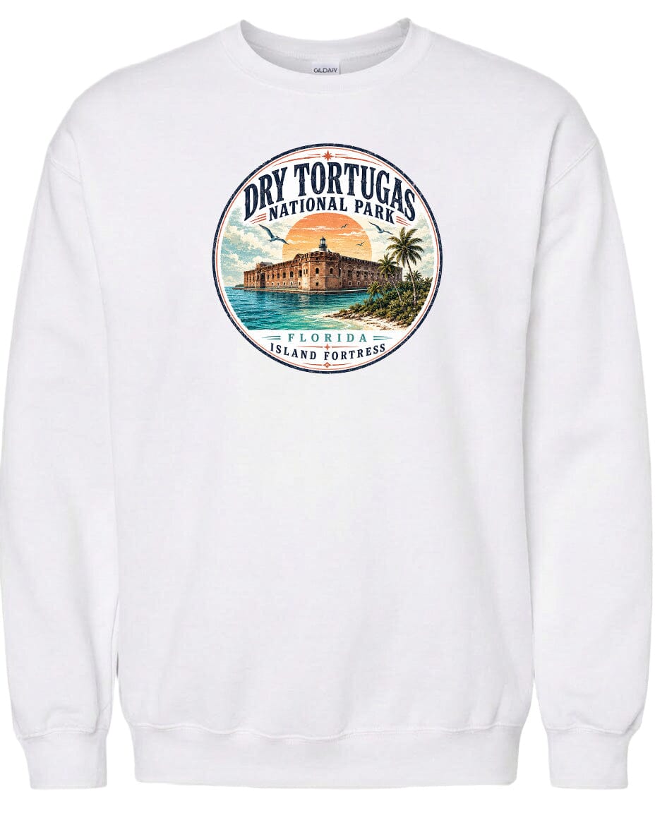 A white sweatshirt with a circular graphic design featuring a building and palm trees, along with the text "Dry Tortugas National Park, Florida Island Fortress".
