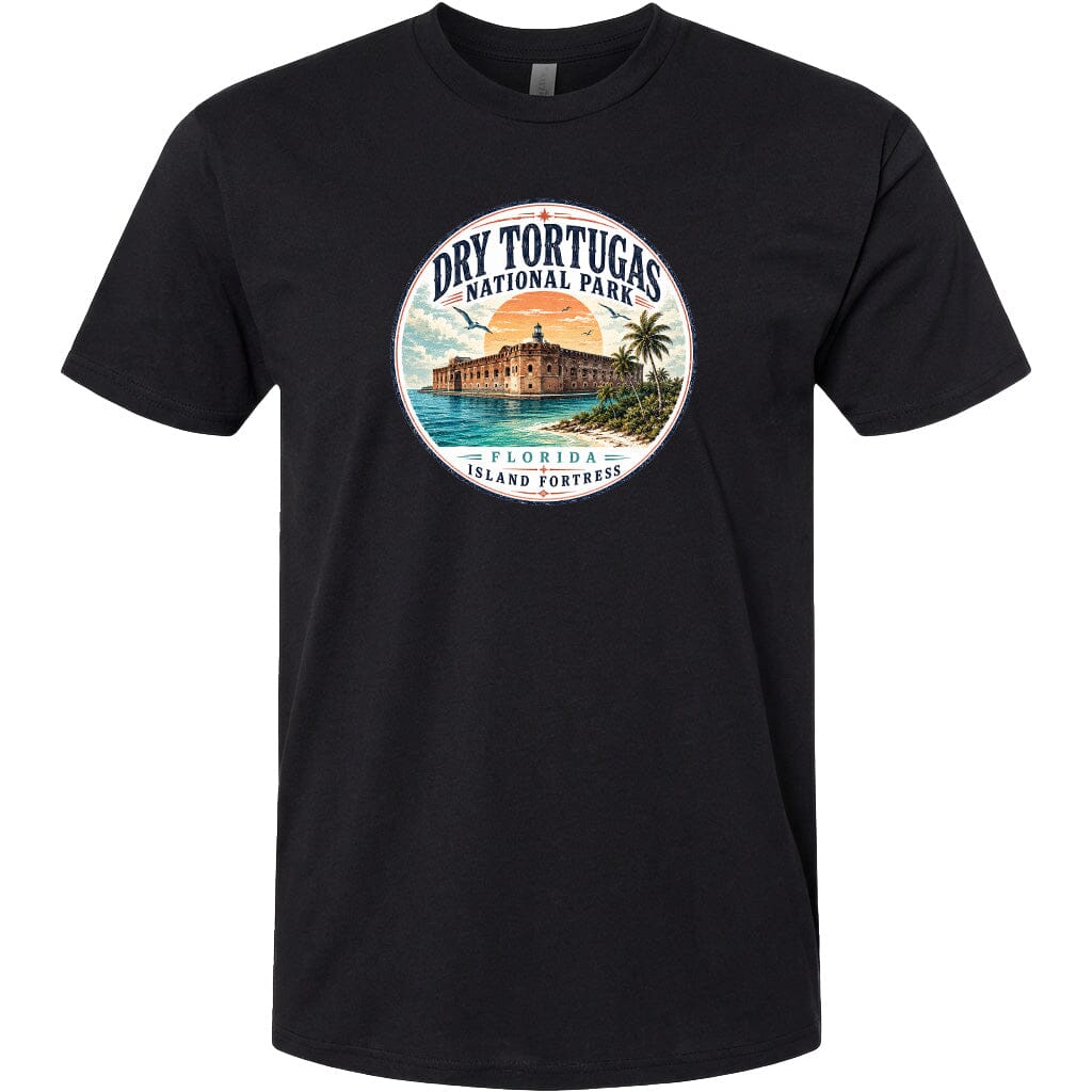 A black t-shirt with a circular graphic design featuring a tropical beach scene with palm trees, a building, and a sunset.