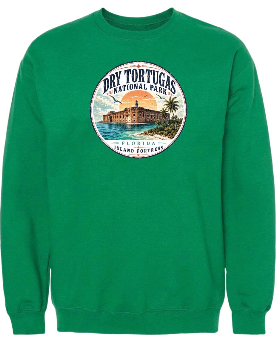 A green sweatshirt with a circular design featuring a building and palm trees, along with the text "Dry Tortugas National Park, Florida Island Fortress".