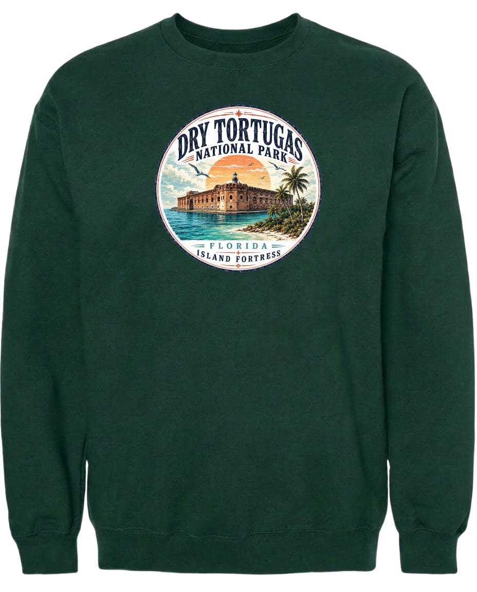 A green sweatshirt with a circular design featuring a tropical island and a building, along with the text "Dry Tortugas National Park" and "Florida Island Fortress".