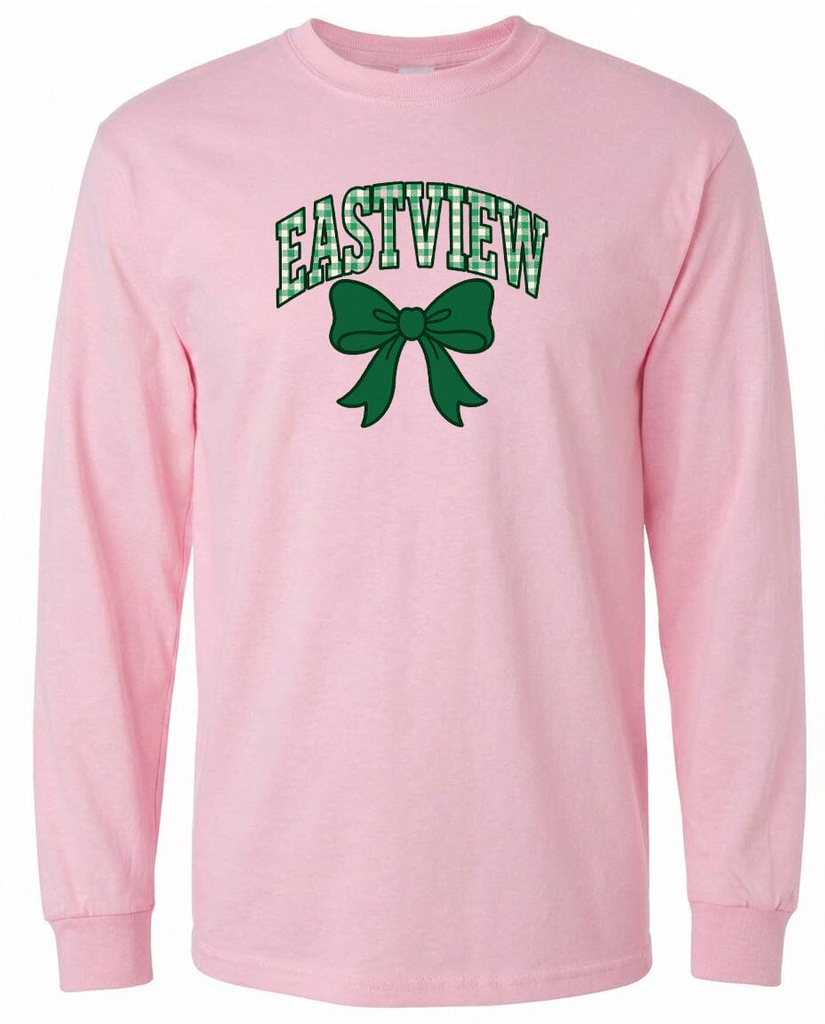 A pink long-sleeved t-shirt with a green bow and the word "EASTVIEW" printed on it.