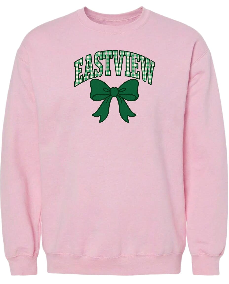 A pink sweatshirt with the word "EASTVIEW" and a green bow printed on it.