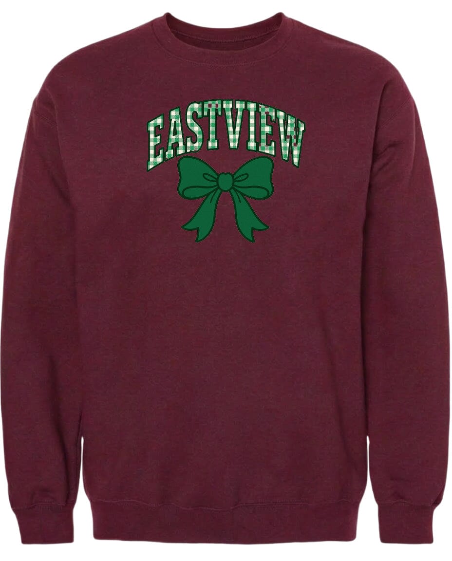 A burgundy sweatshirt with a green bow and the word "EASTVIEW" printed on it.