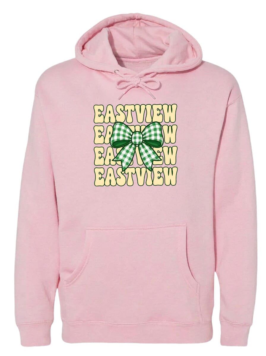 A pink hoodie with a green and white checkered bow on the front.
