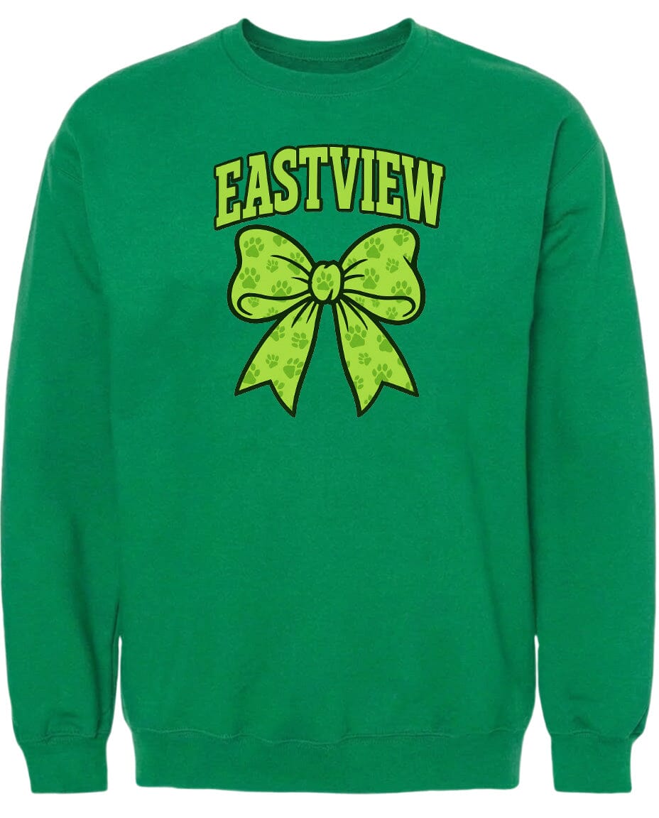 A green sweatshirt with a yellow bow and paw prints printed on it.