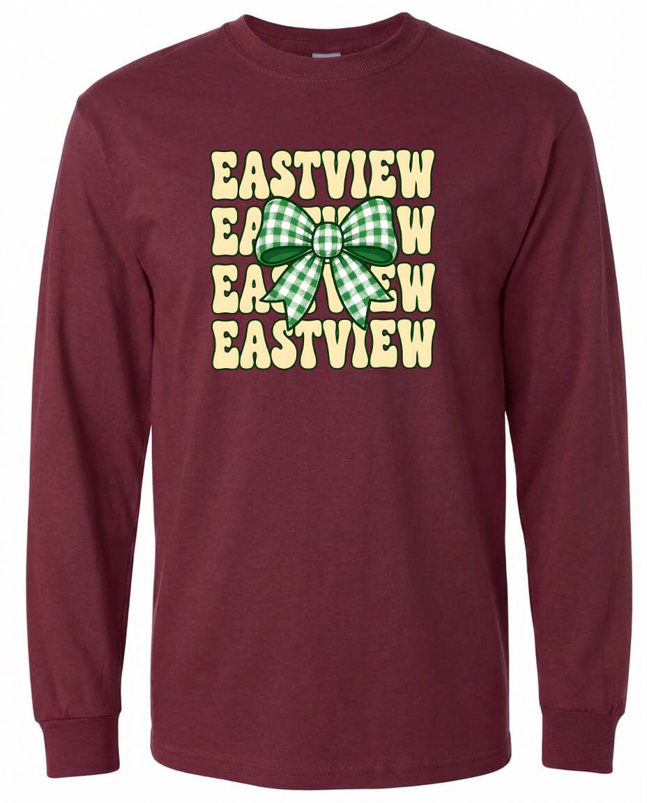 A burgundy long-sleeved t-shirt with a graphic design featuring a green and white checkered bow and the text "EASTVIEW" repeated in a vertical pattern.