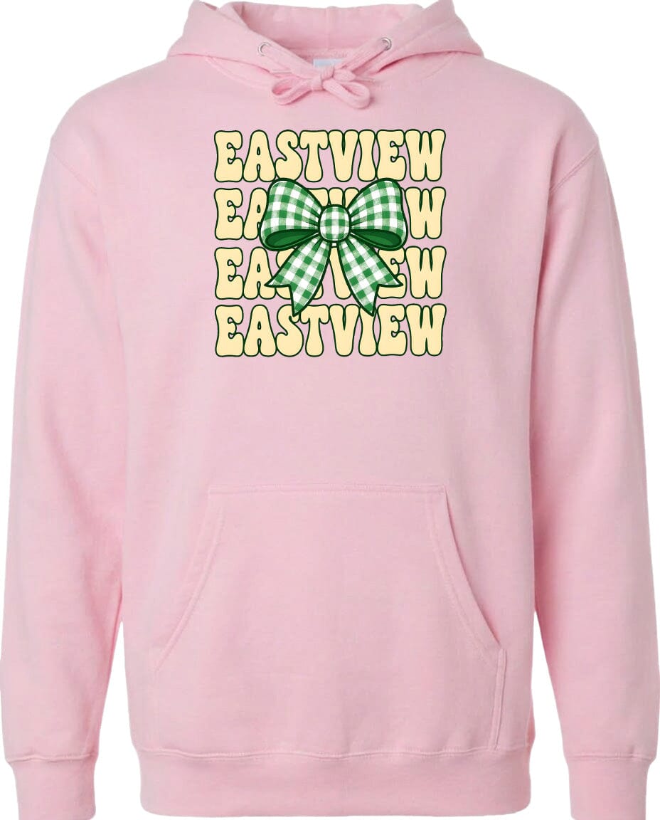 A pink hoodie with a graphic design featuring a green and white checkered bow and the text "EASTVIEW" repeated in a vertical pattern.