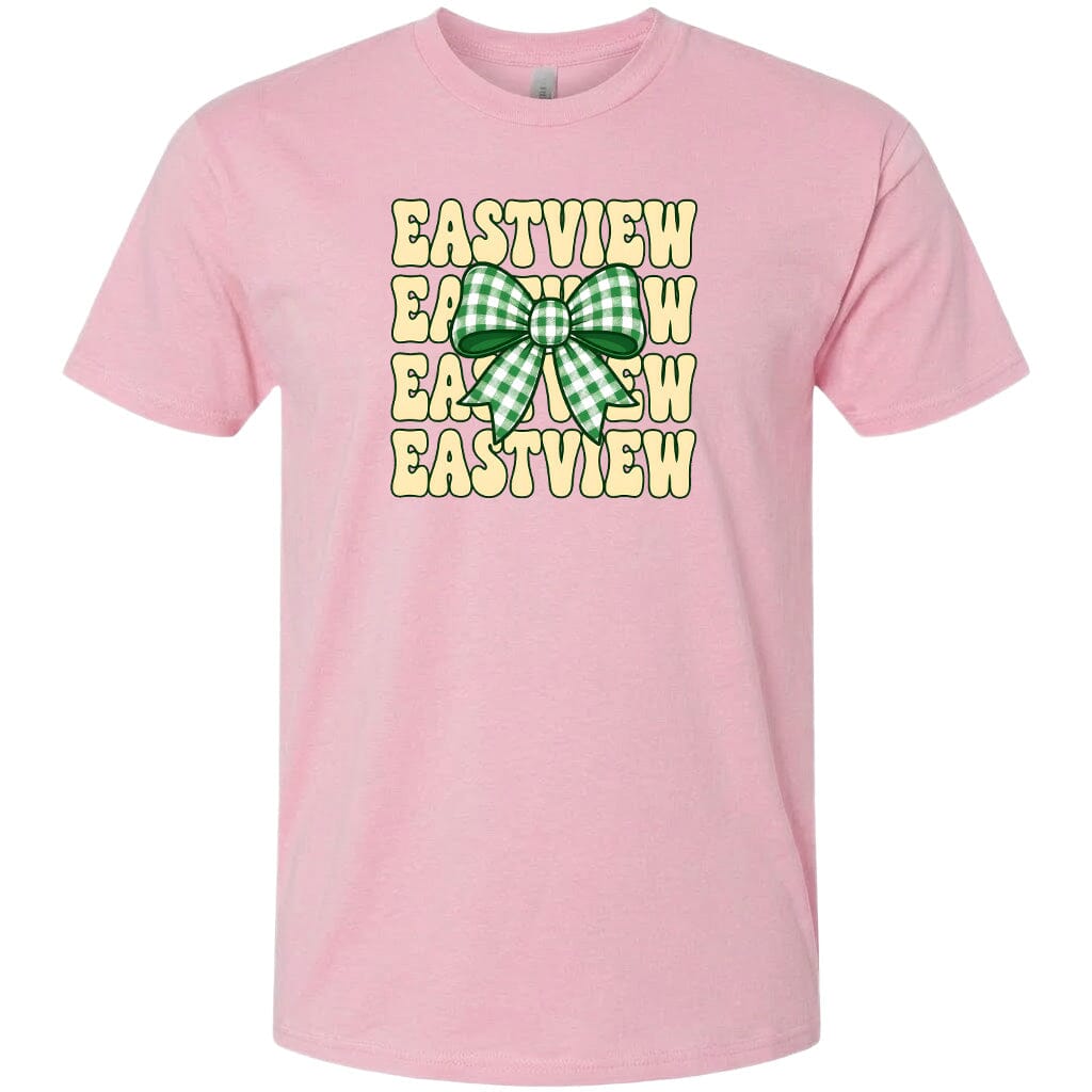A pink t-shirt with a graphic design featuring a green and white checkered bow and the word "EASTVIEW" repeated in a vertical pattern.