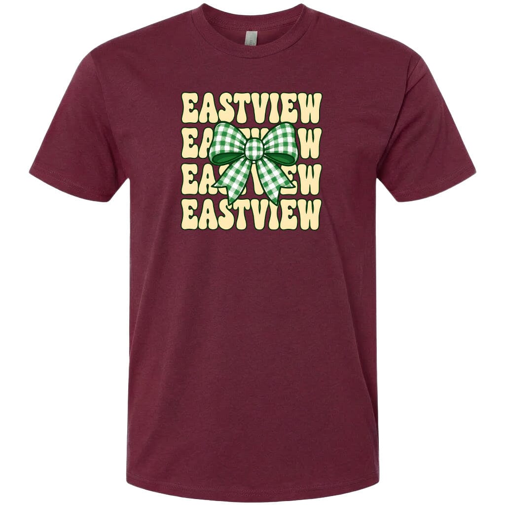 A burgundy-colored t-shirt with a graphic design featuring a green and white checkered bow and the text "EASTVIEW" repeated in a vertical pattern.