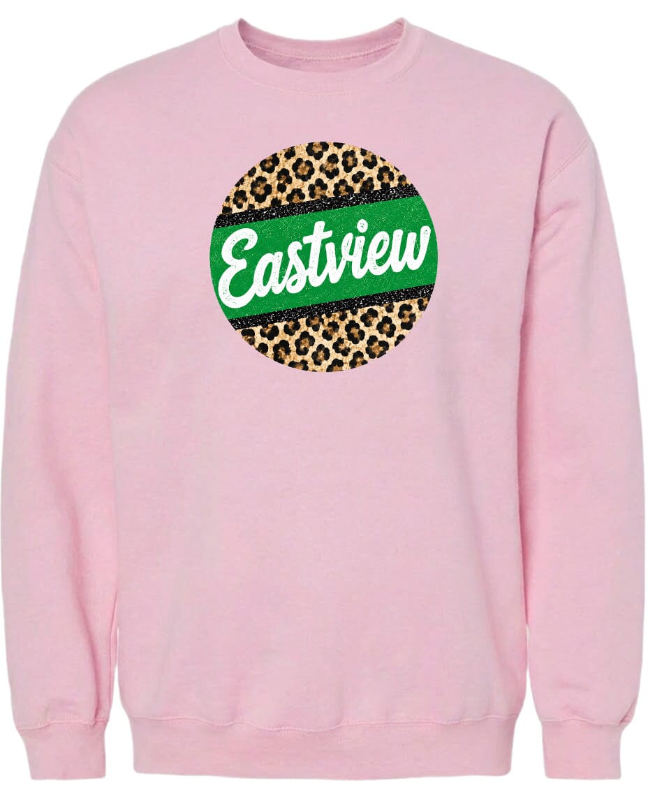 A pink sweatshirt with a circular logo on the front. The logo features a green and leopard print design, and the word "Eastview" written in white text.