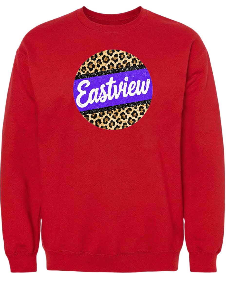 A red sweatshirt with a large circular logo on the front.