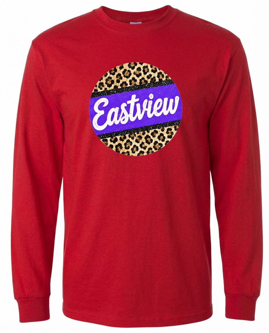 A red long-sleeved shirt with a circular logo on the front. The logo features a leopard print design with a purple stripe.