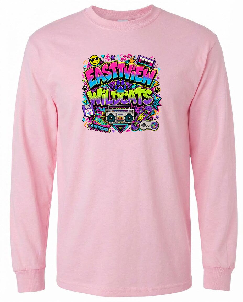 A pink long-sleeved t-shirt with a colorful graphic design featuring the text "EASTVIEW WILDCATS" surrounded by various icons and symbols.