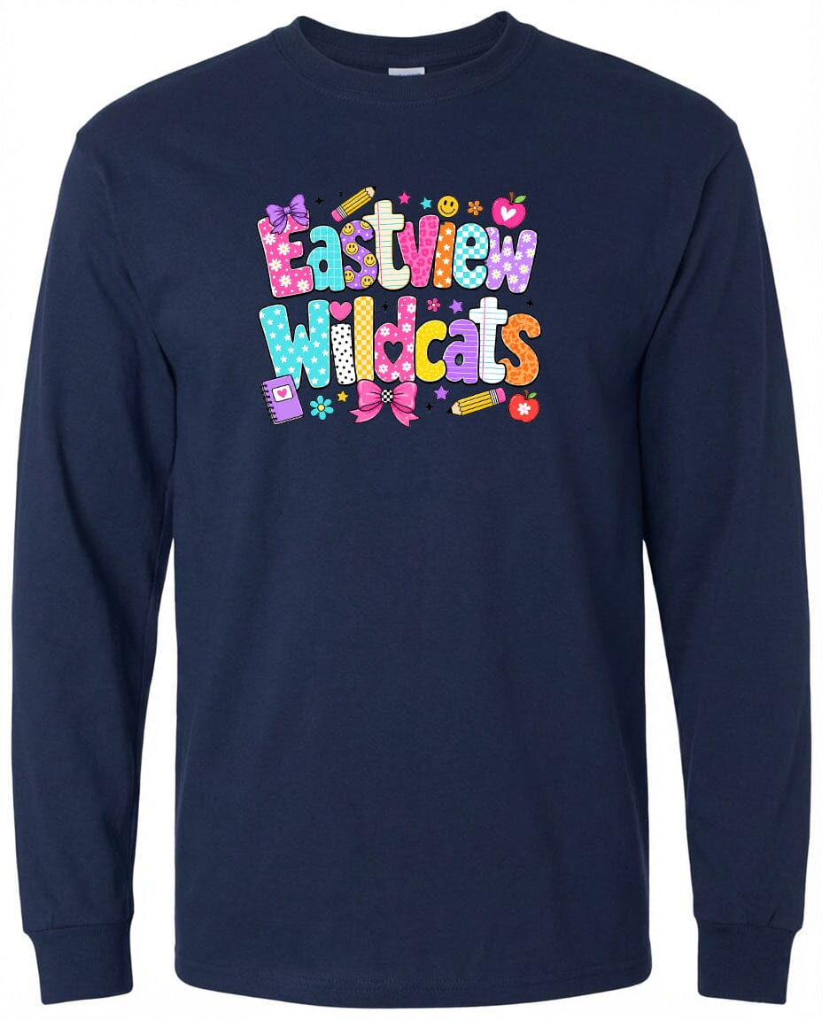 A navy blue long-sleeved shirt with a colorful graphic design featuring the text "Eastview Wildcats" and various decorative elements such as flowers, hearts, and pencils.