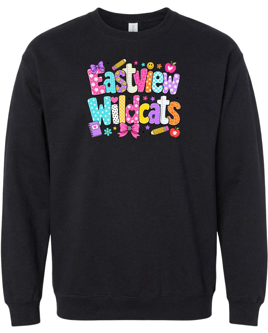 A black sweatshirt with a colorful, playful design featuring the text "Eastview Wildcats" and various decorative elements such as stars, hearts, and flowers.