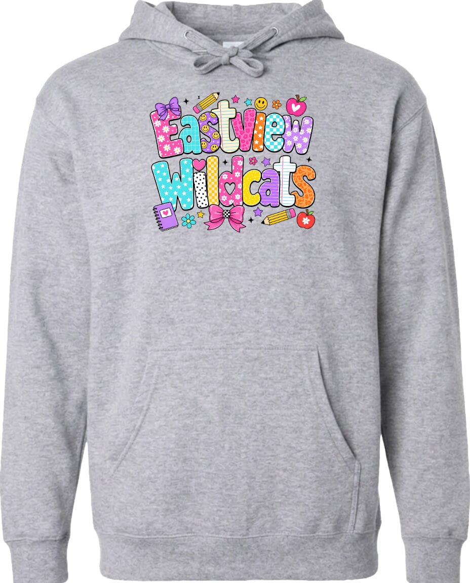 A gray hoodie with a colorful graphic design featuring the text "Eastview Wildcats" and various school-related icons such as pencils, books, and hearts.
