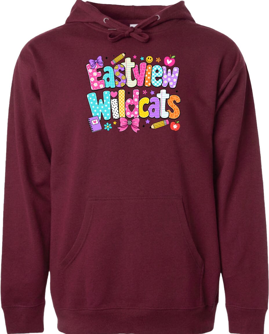 A burgundy hoodie with a colorful graphic design featuring the text "Eastview Wildcats" and various school-related icons such as pencils, apples, and a backpack.
