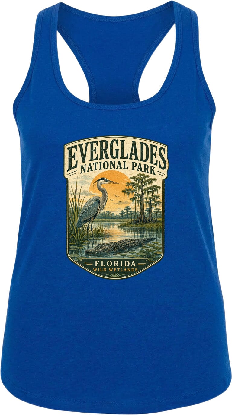A blue tank top with a graphic design depicting a bird, a sunset, and a body of water, along with the text "EVERGLADES NATIONAL PARK FLORIDA" printed on it.