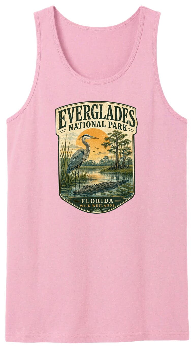 A pink tank top with a graphic design depicting Everglades National Park, featuring a bird, a sunset, and a body of water.
