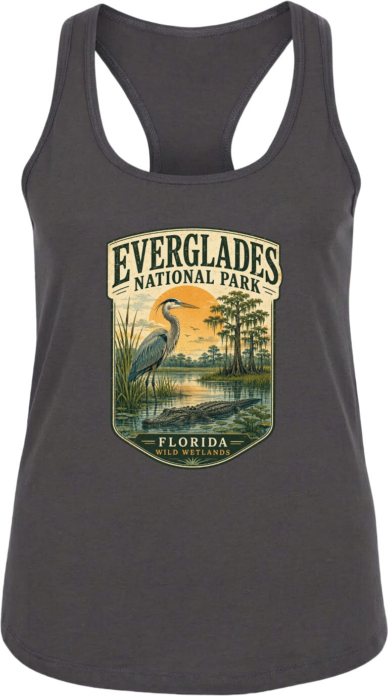 A gray tank top with a graphic design depicting a bird standing in a pond surrounded by trees and a sunset.