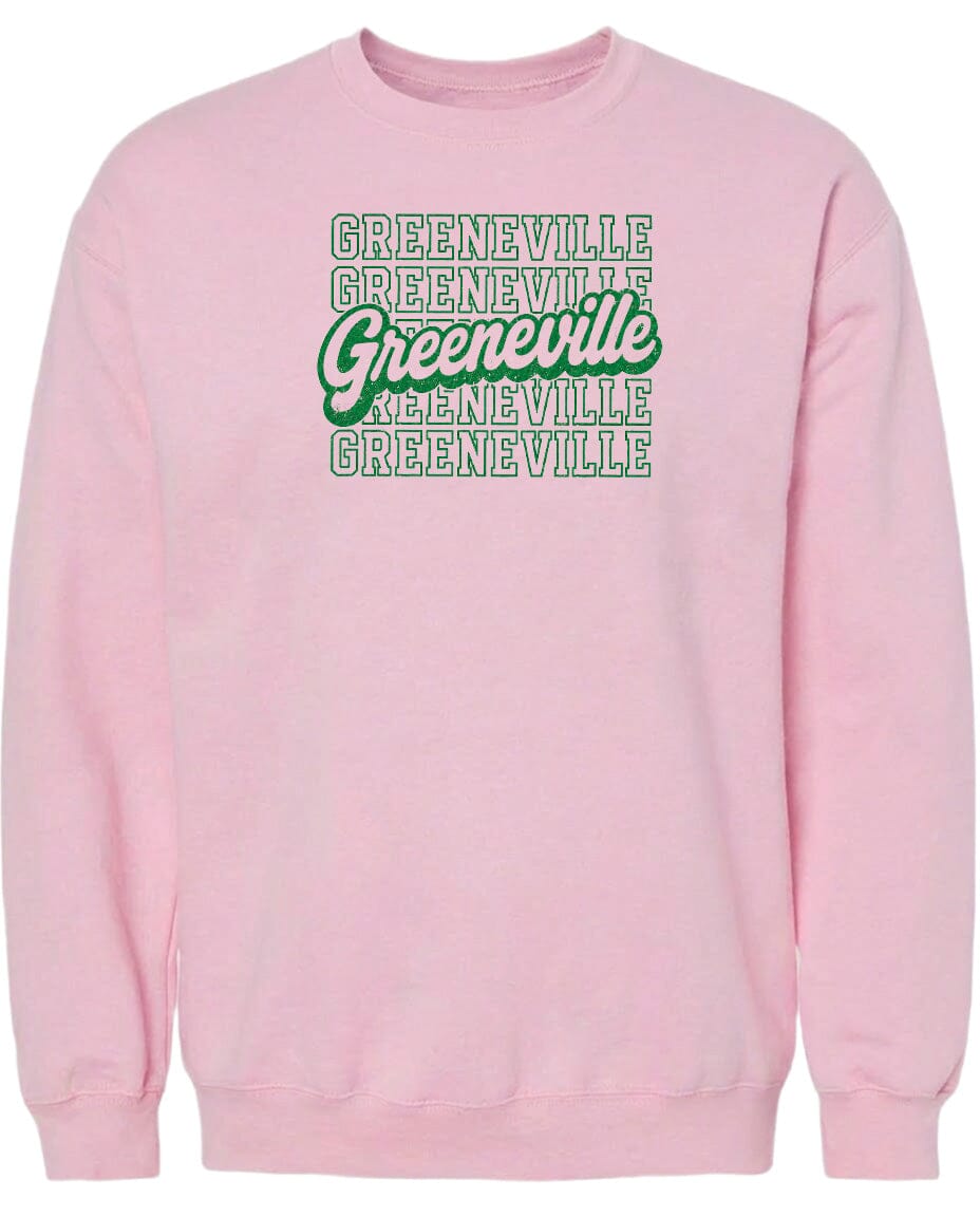 A pink sweatshirt with the text "Greeneville" printed in green and white.