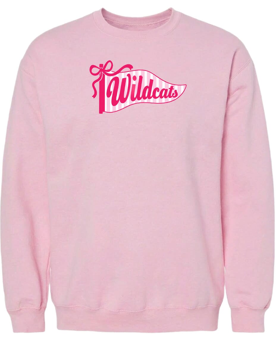 A pink sweatshirt with a graphic design featuring the word "Wildcats" in pink and white colors.