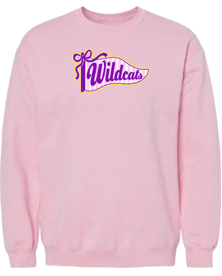 A pink sweatshirt with a purple and yellow graphic design featuring the word "Wildcats" on it.