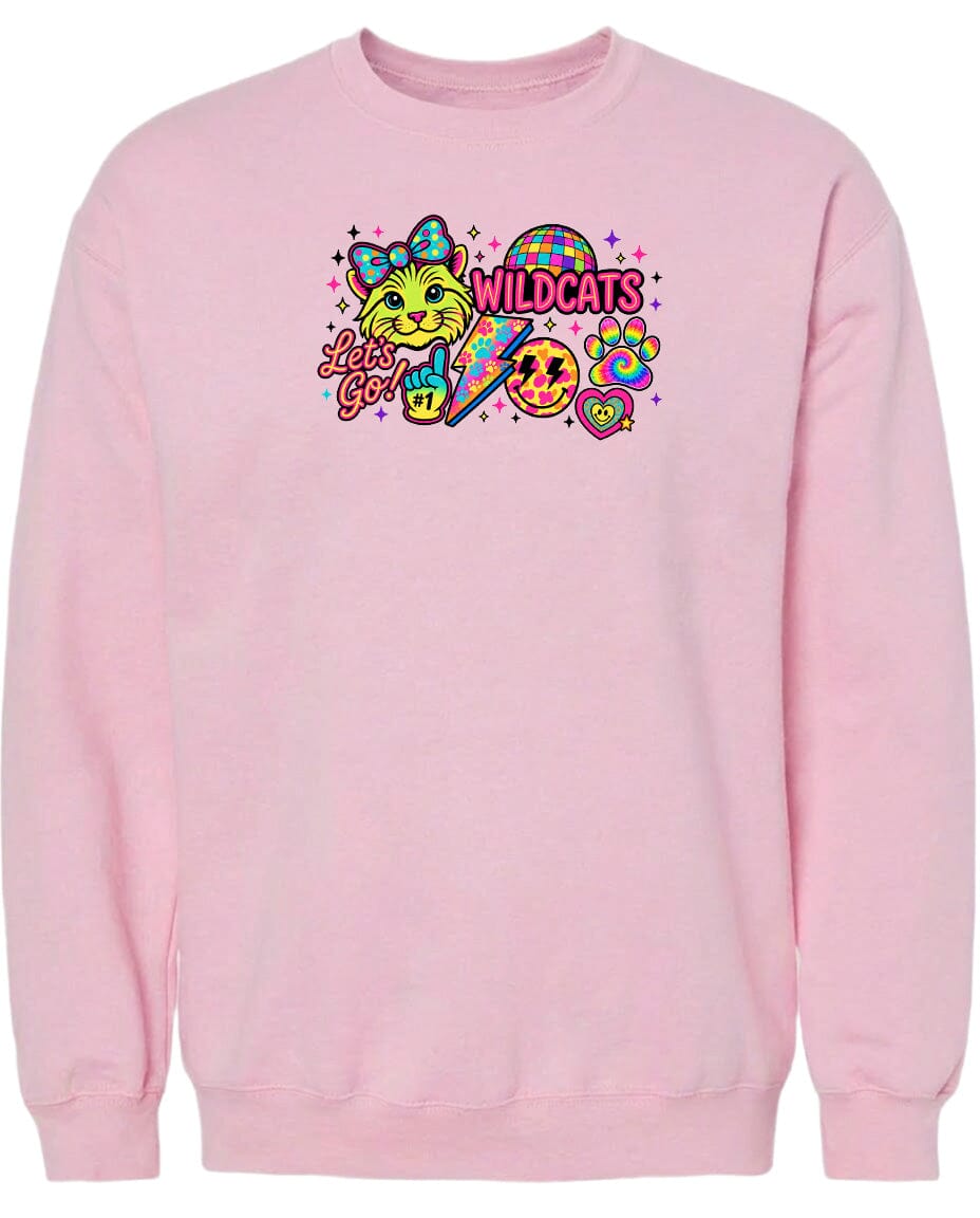 A pink sweatshirt with a colorful graphic design featuring a cat, a rainbow, and various other elements.