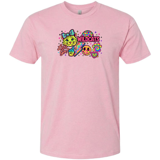 A pink t-shirt with a colorful graphic design featuring a cat, a smiley face, and various other elements.