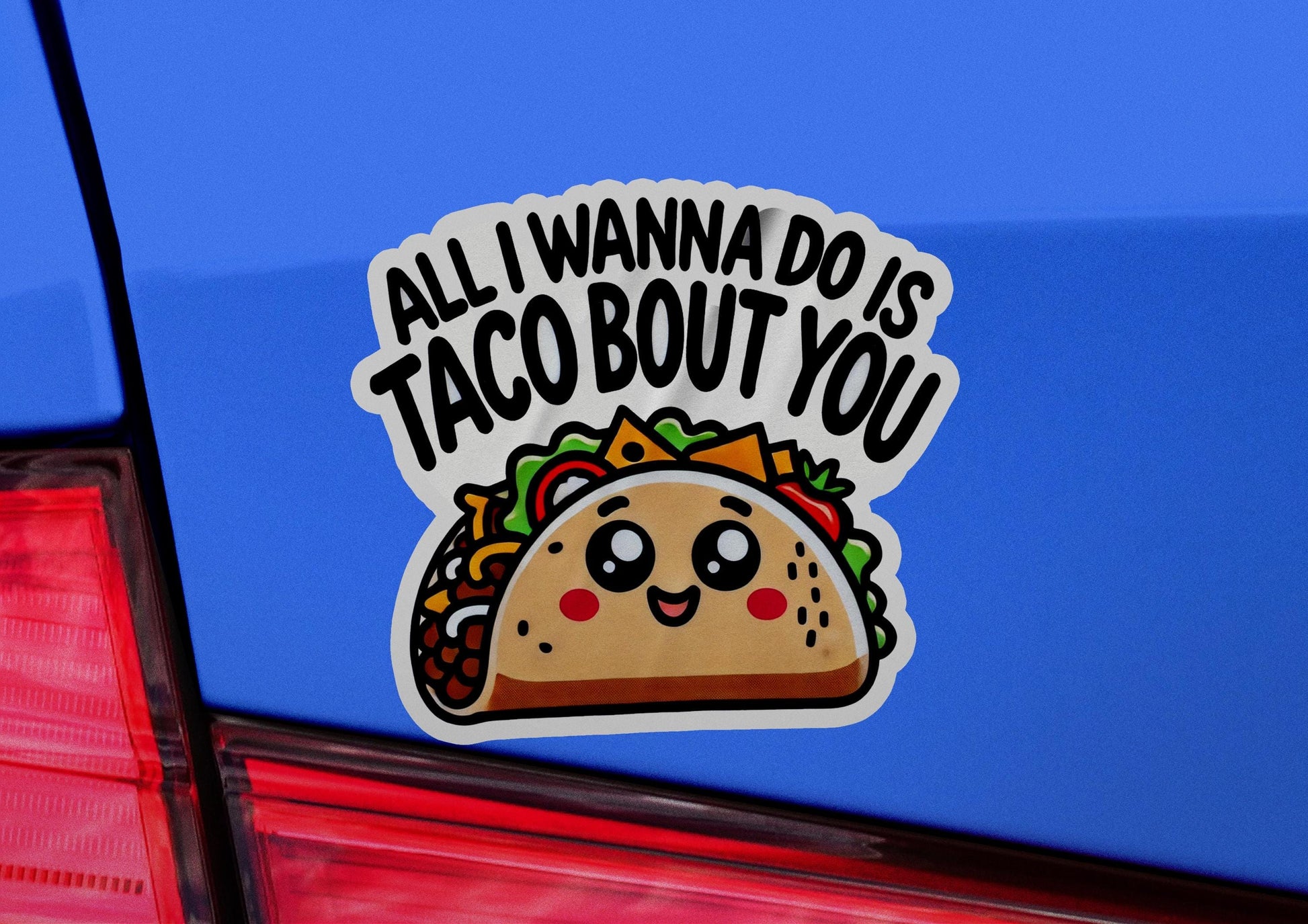 a taco sticker on the back of a car